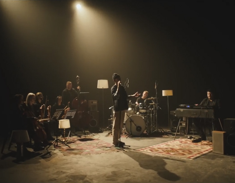 Ілля-Парфенюк-зйомка-кліпу-оркестр-в-кліпі-чорний-павільйон